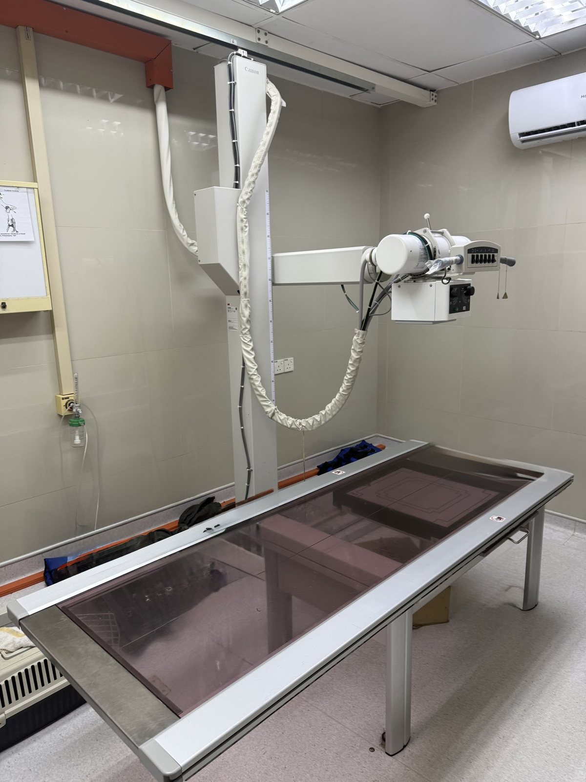 X-ray room with table and overhead tube